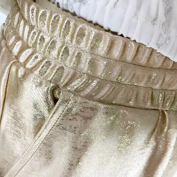 Conjunto - Top con Ojo Dorado y Pantalón de Lentejuelas